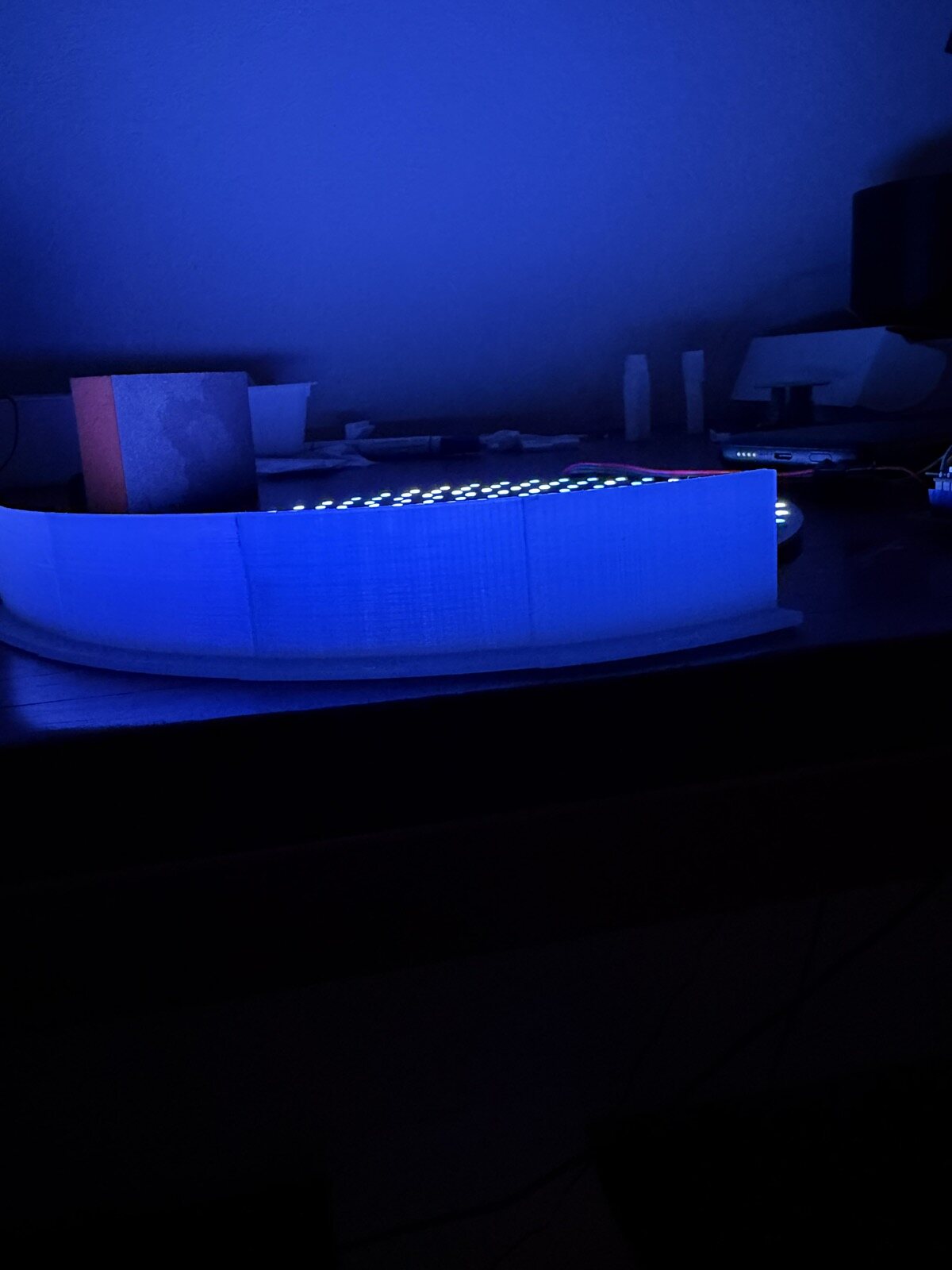 A sanded clear wall section glowing evenly on the disk