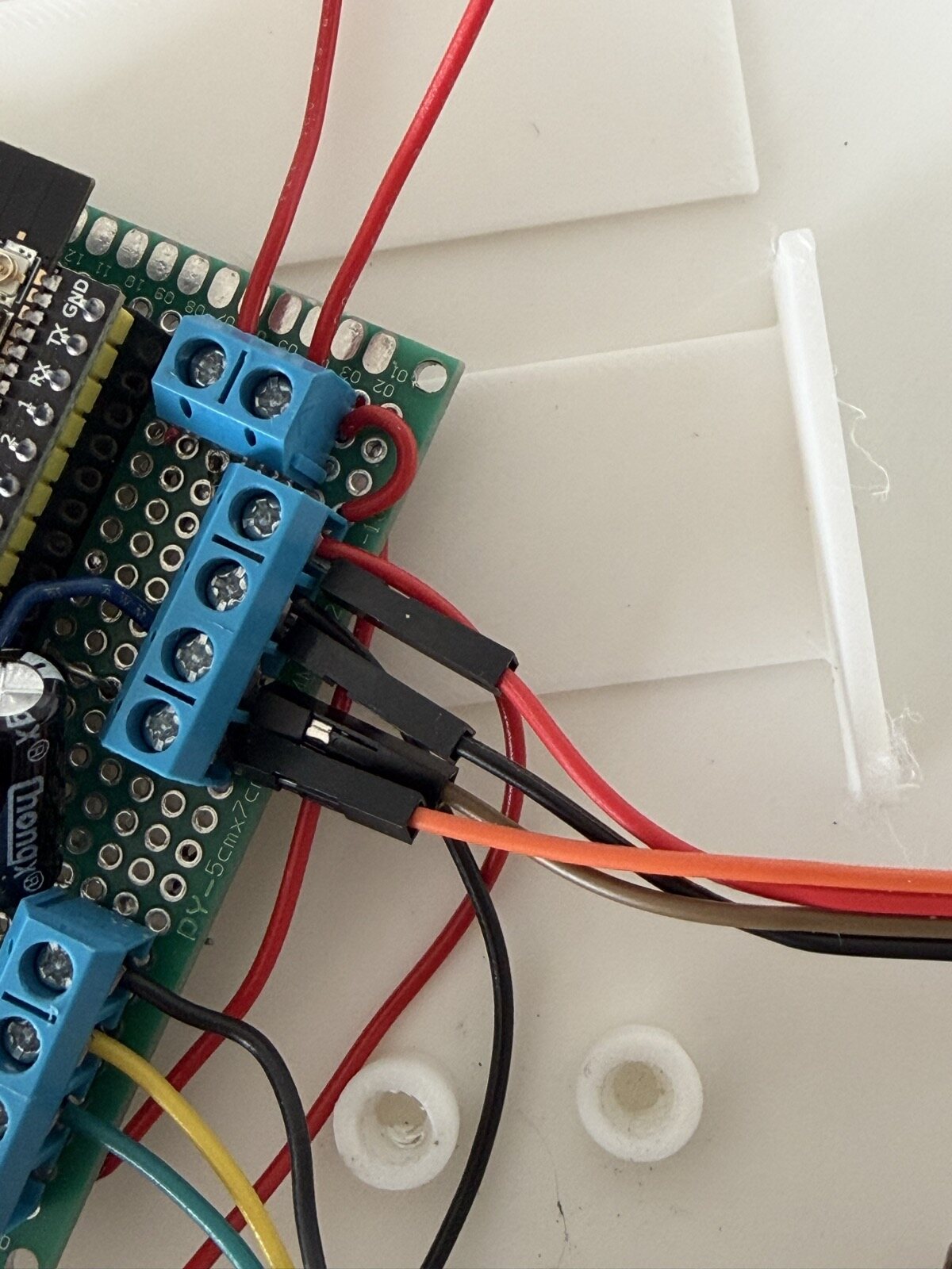 Wires in screw terminals running to the radar board